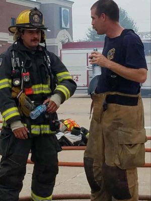 a picture of joe valdez in a firefighter uniform, mental health awareness for first responders 